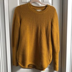 Akini mustard sweater with side zip